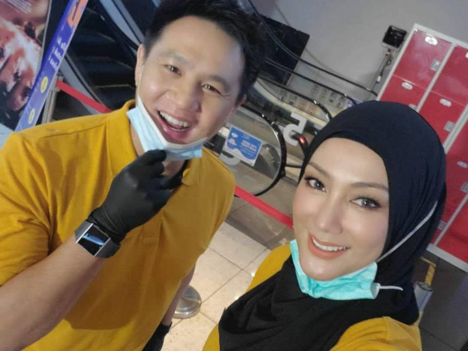 Erra Fazira (R) seen here with actor Douglas Lim.