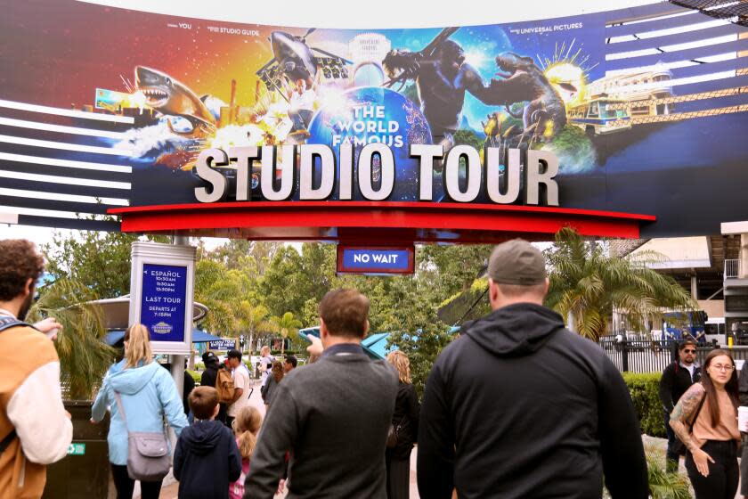 UNIVERSAL CITY, CA - MAY 25, 2023 - Visitors head to the studio tour of Universal Studios on May 25, 2023. (Genaro Molina / Los Angeles Times)