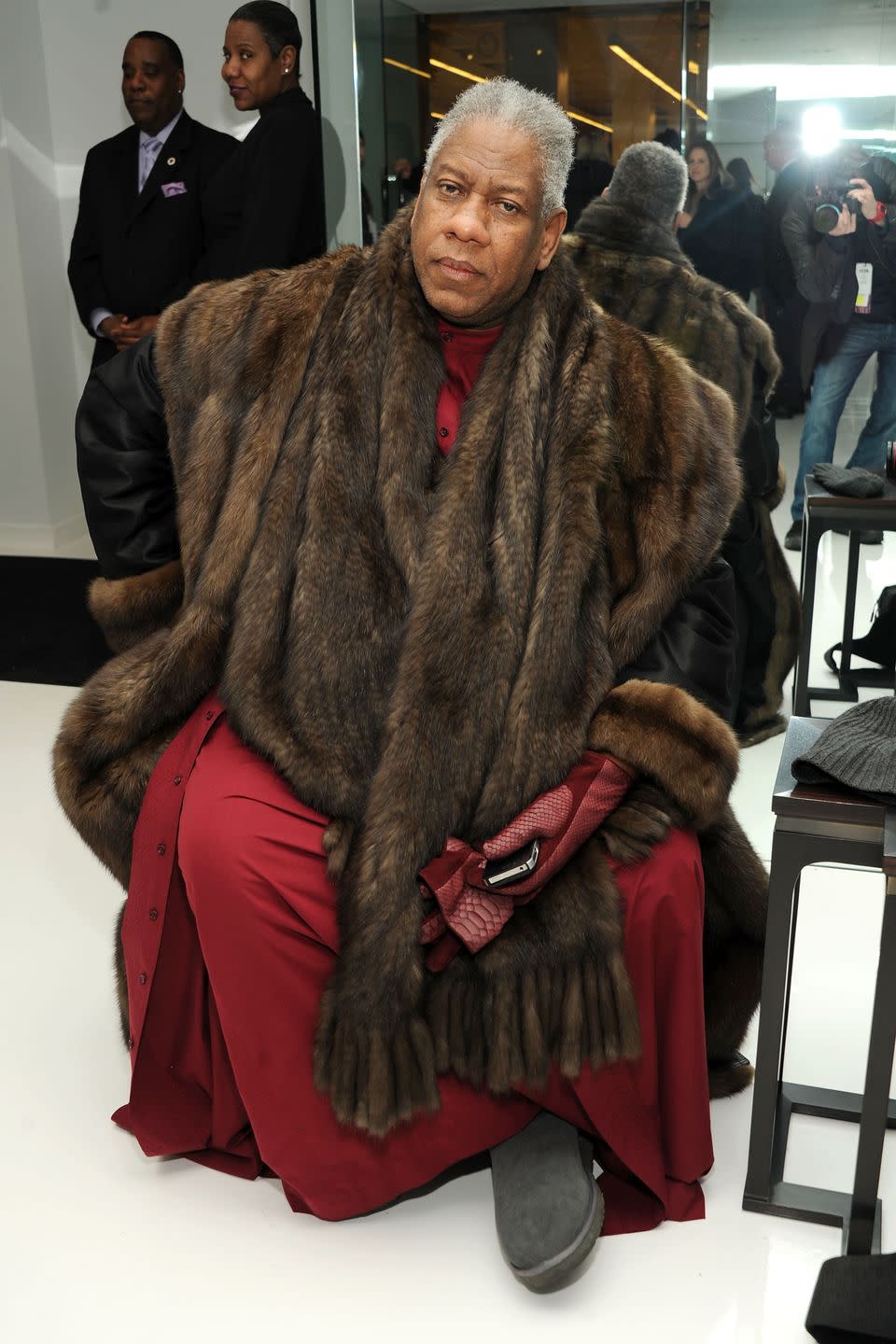 <p>The fashion legend unapologetically never quite got the memo about fur being over. Here, he pairs a fur-trimmed coat with a gigantic fur stole, and cosy <a href="https://www.elle.com/uk/fashion/trends/a38768153/ugg-boots-trend/" rel="nofollow noopener" target="_blank" data-ylk="slk:UGGs;elm:context_link;itc:0;sec:content-canvas" class="link ">UGGs</a> – a classic Talley FROW look.</p>