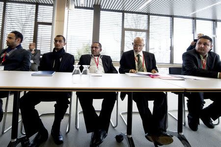 Members of delegations from Sanaa attend with U.N. Secretary-General Special Envoy Ismail Ould Cheikh Ahmed (not pictured) the Yemen peace talks in Switzerland December 15, 2015. REUTERS/UN Photo/Jean-Marc Ferre/Handout via Reuters