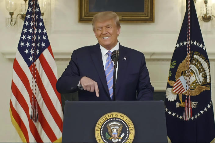 Footage released by the House select committee on Thursday shows former President Donald Trump recording a video statement at the White House on Jan. 7, 2021. (House Select Committee via AP)