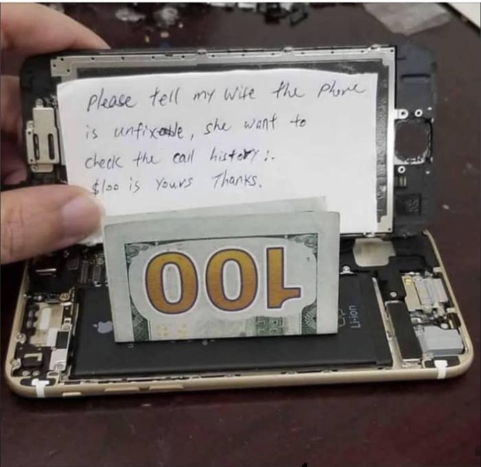 A broken smartphone with a note hidden inside reading, "Please tell my wife the phone is unfixable, she wants to check the call history. $100 is yours. Thanks." 