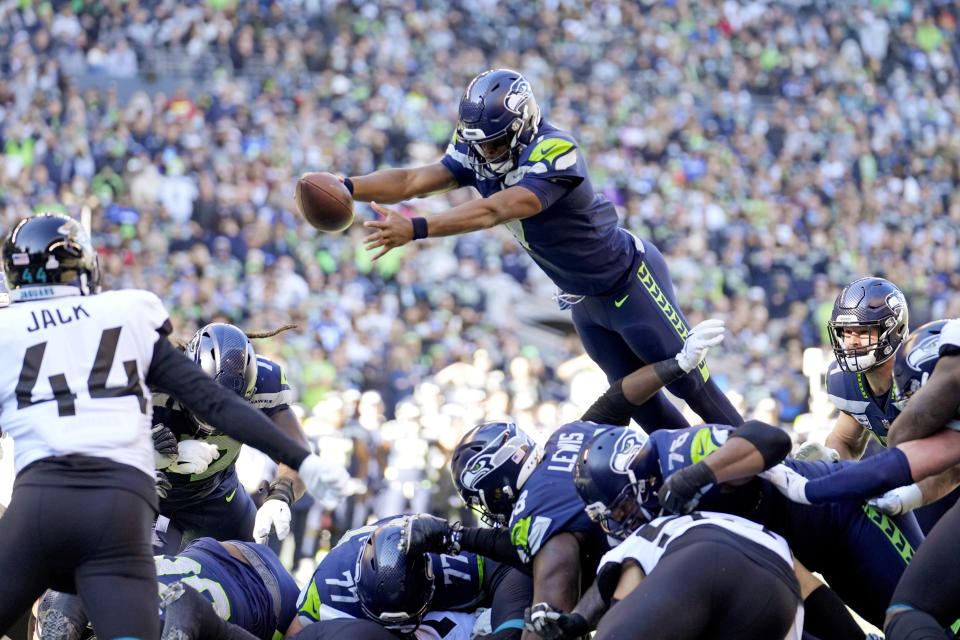 Geno Smith took a leap for Seattle in 2022. (AP Photo/Stephen Brashear)