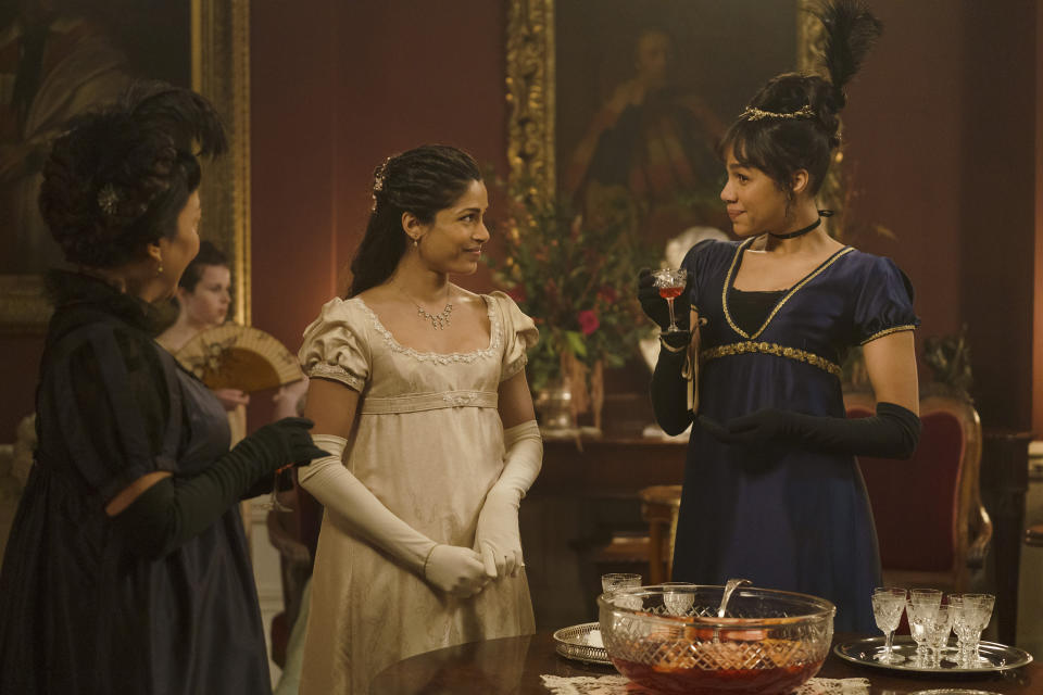 This image released by Bleecker Street shows Freida Pinto, center, and Zawe Ashton in a scene from "Mr. Malcolm's List." (Ross Ferguson/Bleecker Street via AP)