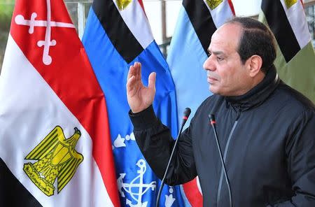 Egyptian President Abdel Fattah Al Sisi speaks with students during a follow-up on training and rehabilitation programs at the Military Academy in Cairo, Egypt, February 19, 2018 in this handout picture courtesy of the Egyptian Presidency. The Egyptian Presidency/Handout via REUTERS