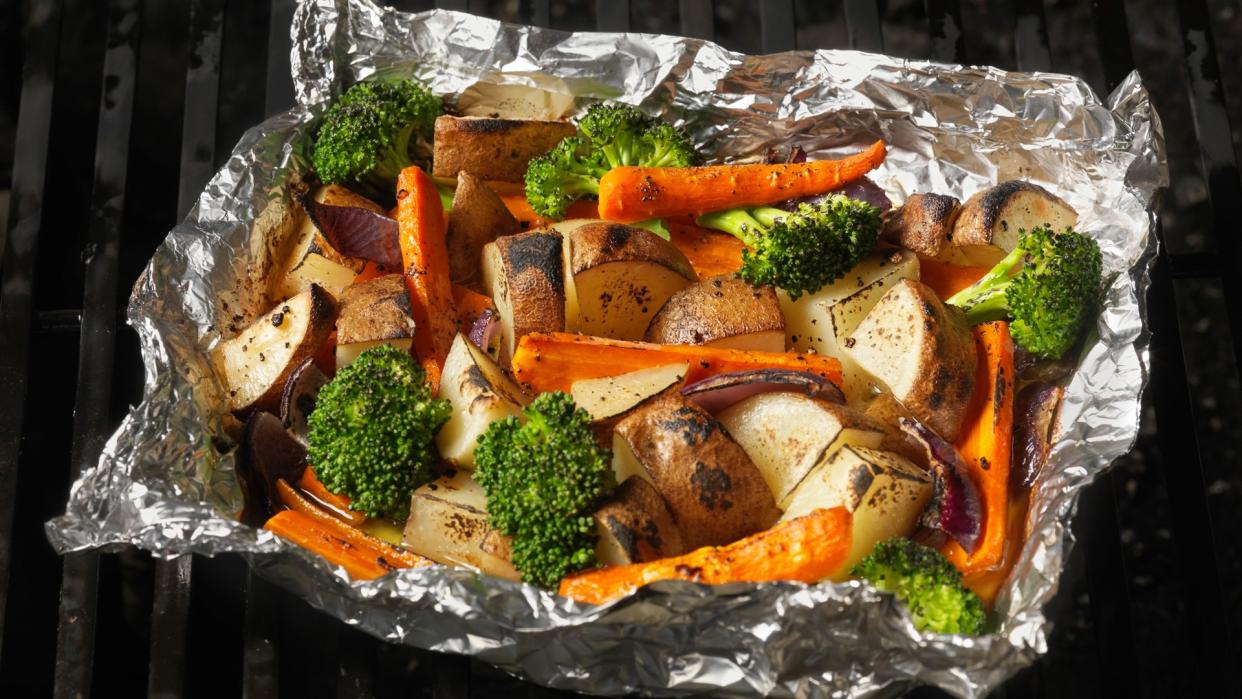 Cooked Vegetables in Tinfoil on the BBQ Grill -Photographed on Hasselblad H3D-39mb Camera.