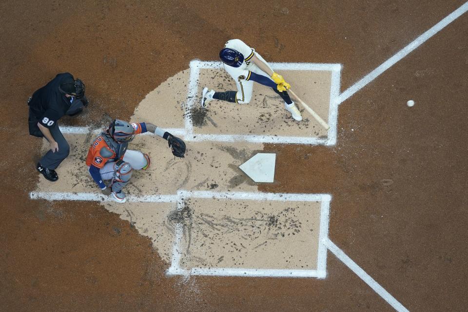 Milwaukee Brewers' Willy Adames hits a two-run home run during the first inning of a baseball game against the Houston Astros Wednesday, May 24, 2023, in Milwaukee. (AP Photo/Morry Gash)