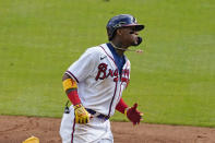 Atlanta Braves' Ronald Acuna Jr. rounds the bases after hitting a solo home run in the second inning of a baseball game against the Washington Nationals, Monday, May 31, 2021, in Atlanta. (AP Photo/John Bazemore)