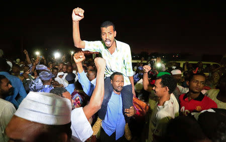 Supporters carry a released politician outside the National Prison, after demonstrations in Khartoum, Sudan February 18, 2018. REUTERS/Mohamed Nureldin Abdallah