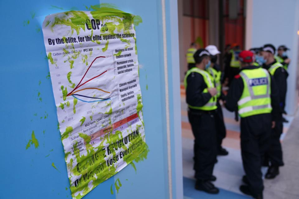 Poster displays IPCC projections for future global heating under different levels of pollution (PA)