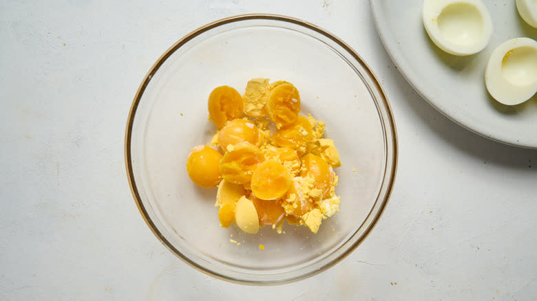 hard boiled egg yolks in glass bowl