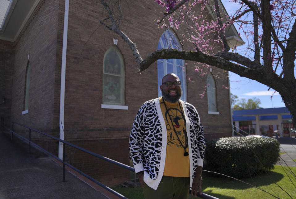 Lama Rod Owens stands for a portrait outside of his childhood church, The Metropolitan United Methodist Church in Rome, Georgia, on Saturday, March 30, 2024. Today Owens is an influential voice in a new generation of Buddhist teachers. (AP Photo/Jessie Wardarski)