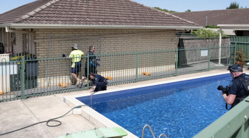 Police investigators at the Adelaide pool where Kreya Patel drowned. 
