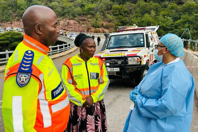 <p>Limpopo Department of Transport and Community Safety/Facebook</p> Authorities at the scene of Mmamatlakala, South Africa bridge