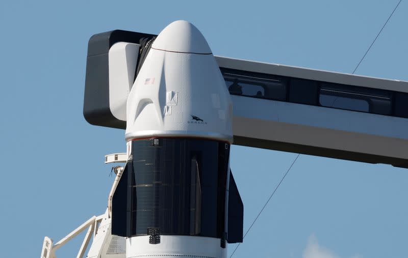 A SpaceX Falcon 9 with the Crew Dragon capsule stands on Pad-39A in preparation for the Inspiration 4 civilian crew mission at the Kennedy Space Center