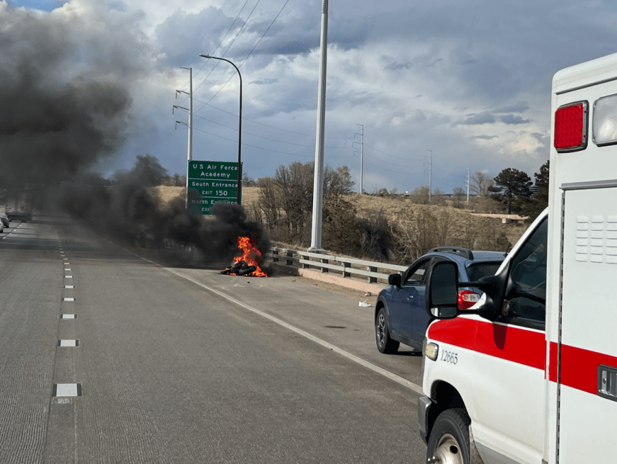 Motorcycle on fire on I-25 near Woodmen Road