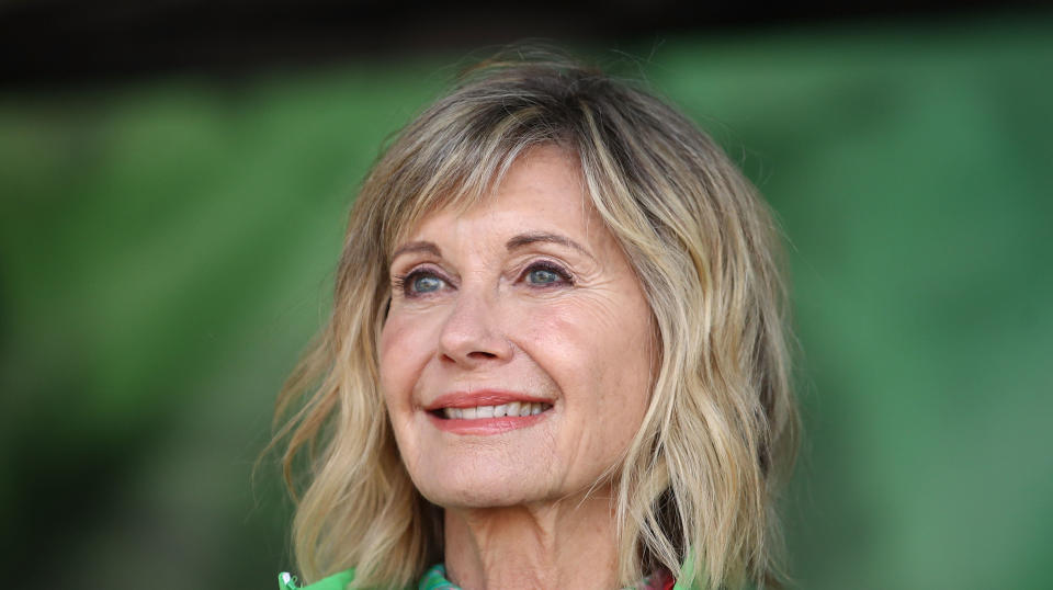 Olivia Newton-John quashed rumors that she's "clinging to life," appearing in