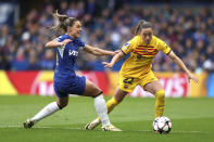 Barcelona's Ona Batlle, right, and Chelsea's Johanna Rytting Kaneryd, left, challenge for the ball during the Women's Champions League, semi final second leg, soccer match between FC Chelsea and FC Barcelona in London, England, Saturday, April 27, 2024. (Kieran Cleeves/PA via AP)