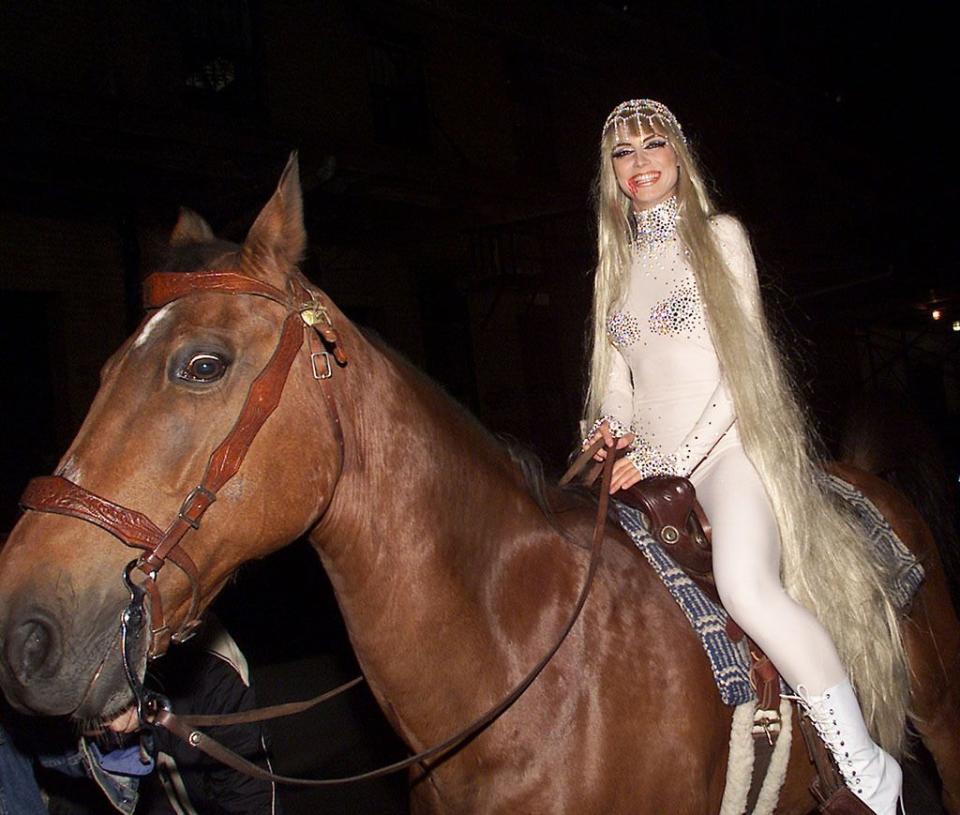<p>No. 5: This was a game-changer! As the famously nude Lady Godiva, a platinum-wig-wearing Klum arrived at her 2001 party and made quite an entrance — on horseback. While the costume was fairly simple, her showstopping arrival was a move that really upped the ante and demonstrated that she was serious about becoming the Halloween queen. She’s been ruling the night ever since! (Photo: Evan Agostini/Getty Images) </p>