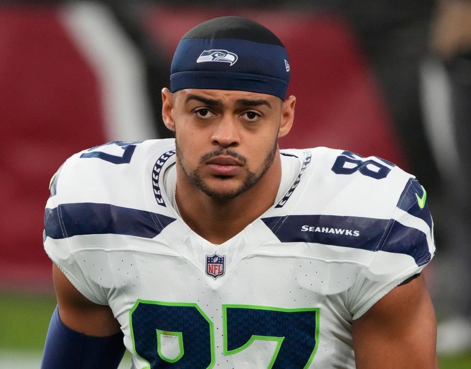 Seattle Seahawks tight end Noah Fant looks on against the Arizona Cardinals in January. The Seahawks agreed to terms with Fant and defensive lineman Leonard Williams, two people with knowledge of the deals said Monday.
