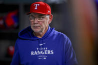 Texas Rangers manager Bruce Bochy walks through the dugout after the eighth inning of a baseball game against the Houston Astros, Monday, April 8, 2024, in Arlington, Texas. (AP Photo/Gareth Patterson)