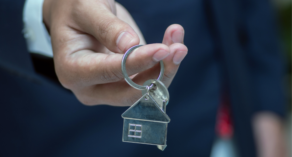 Landlord holding key