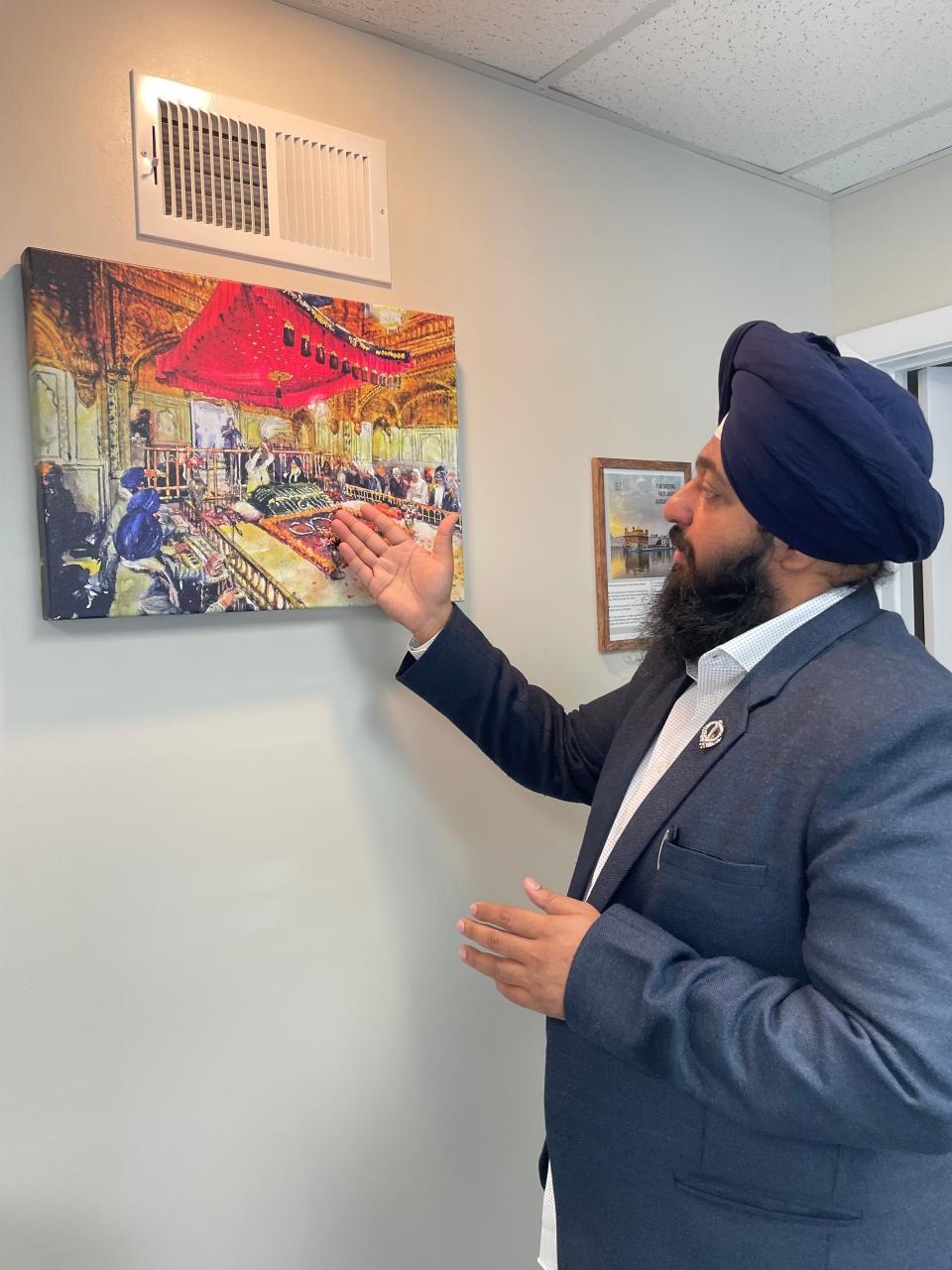 Swaranjit Singh Khalsa at the Sikh Art Gallery in Norwich where he and others met with a federal justice department official concerning a recent "hate messaging" incident in the city