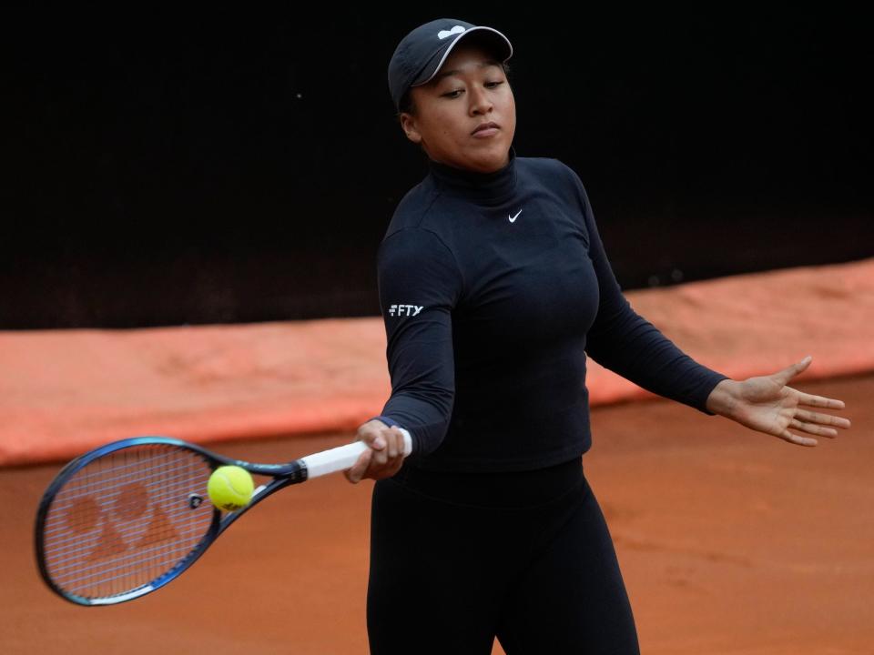 Naomi Osaka hits a forehand during a practice session.