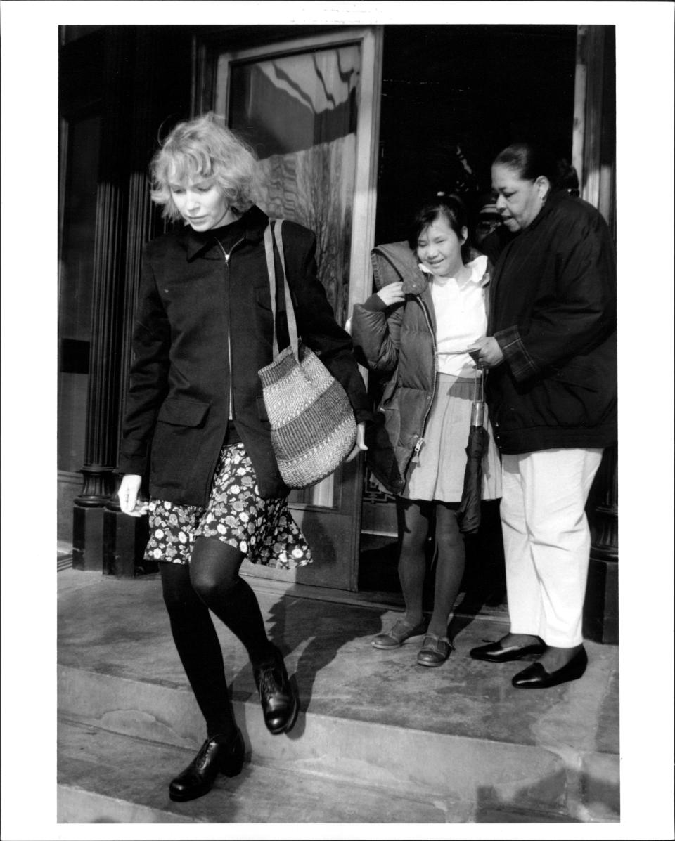 Mia Farrow emerges from her apartment. on Central Park West with daughter Tam. March 23, 1993. (Photo by Robert Kalfus/New York Post Archives /(c) NYP Holdings, Inc. via Getty Images)