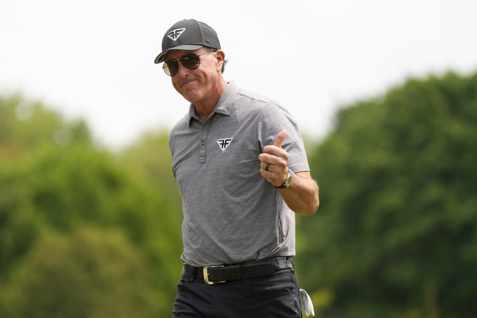 Phil Mickelson celebrates after a birdie on the fifth hole during the second round of the PGA Championship golf tournament at Oak Hill Country Club on Friday, May 19, 2023, in Pittsford, N.Y. (AP Photo/Seth Wenig)