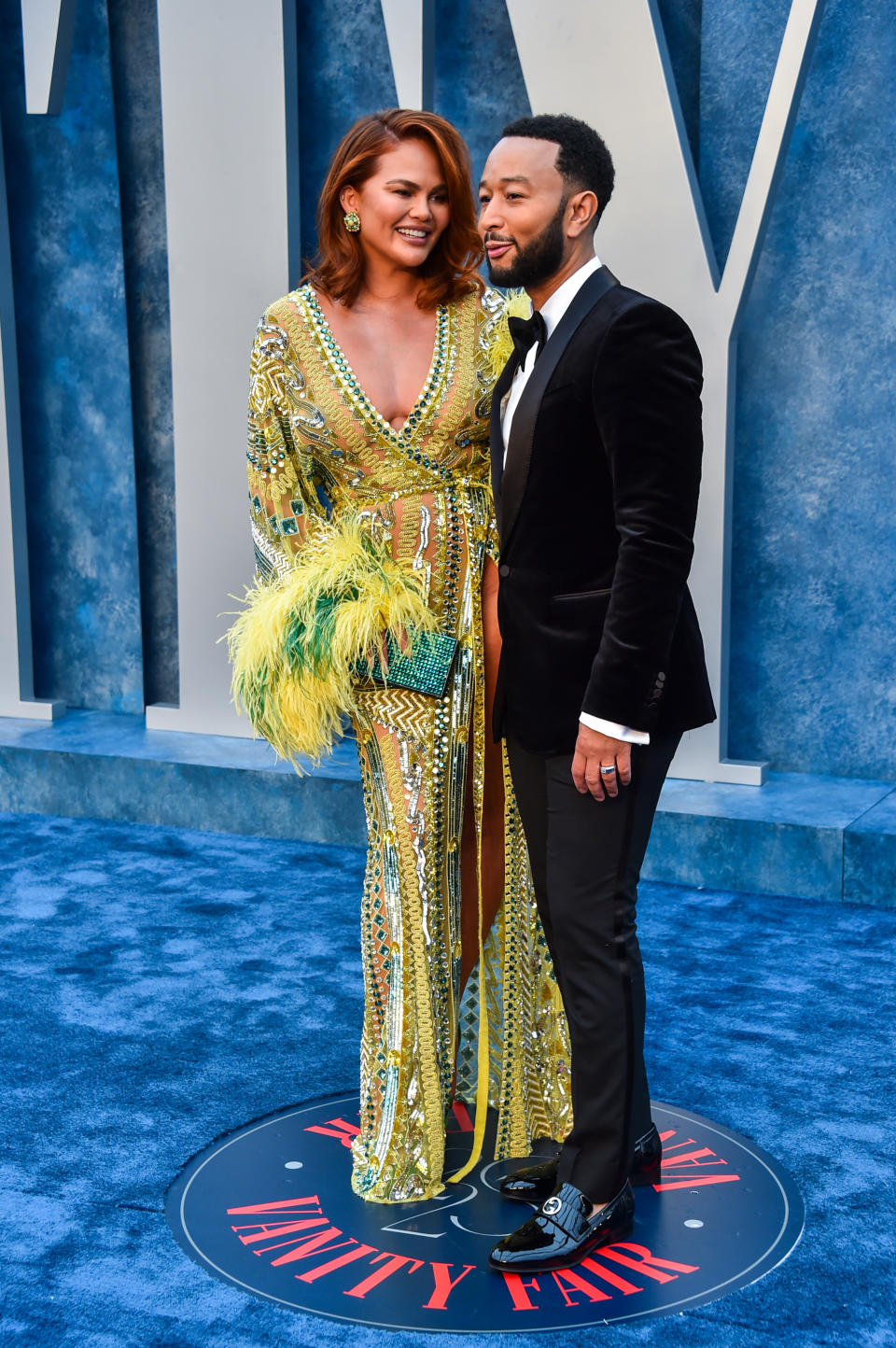 Chrissy Teigen and John Legend arrive at the 2023 Vanity Fair Oscar Party held at the Wallis Annenberg Center for the Performing Arts on March 12, 2023 in Beverly Hills, California.