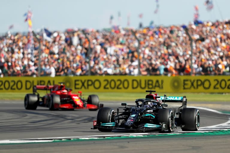 Final twist: Lewis Hamilton passed Charles Leclerc with two laps to go at Silverstone