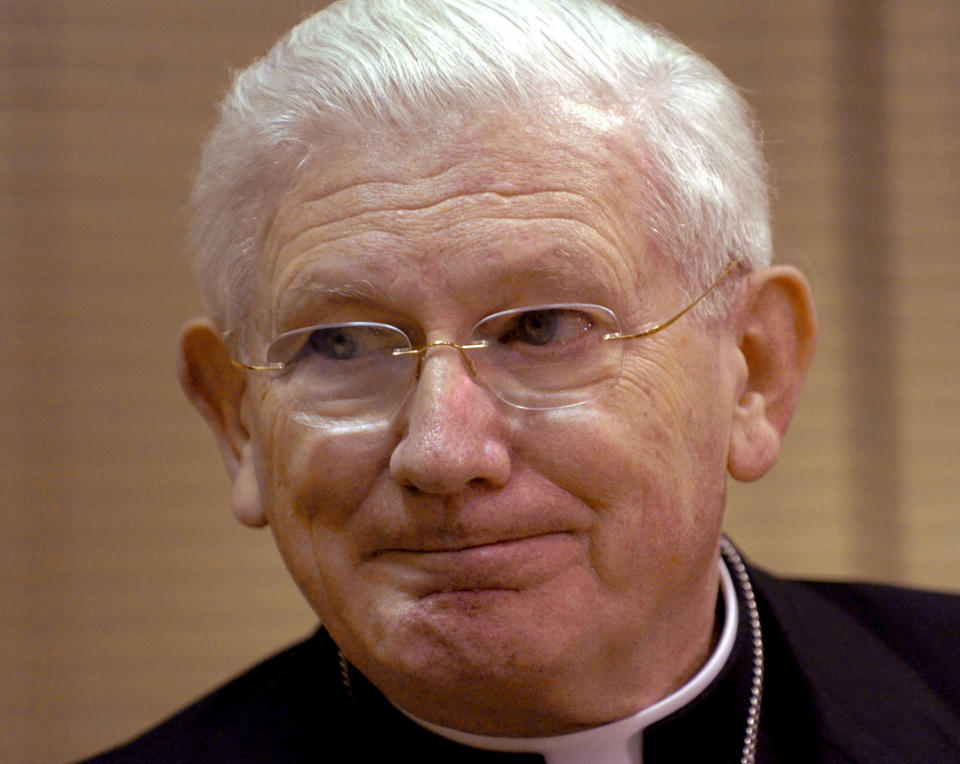 FILE - In this Saturday, April 2, 2005, file photo, Baltimore Cardinal William Keeler speaks to reporters before conducting Mass at The Cathedral of Mary Our Queen, in Baltimore. Keeler, who helped ease tensions between Catholics and Jews, has died. (AP Photo/Gail Burton, File)
