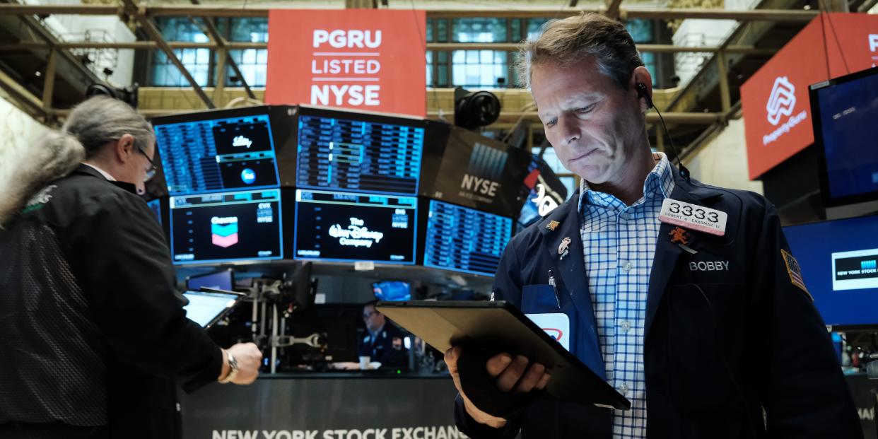 Traders work on the floor of the New York Stock Exchange (NYSE) on March 18, 2022 in New York City.