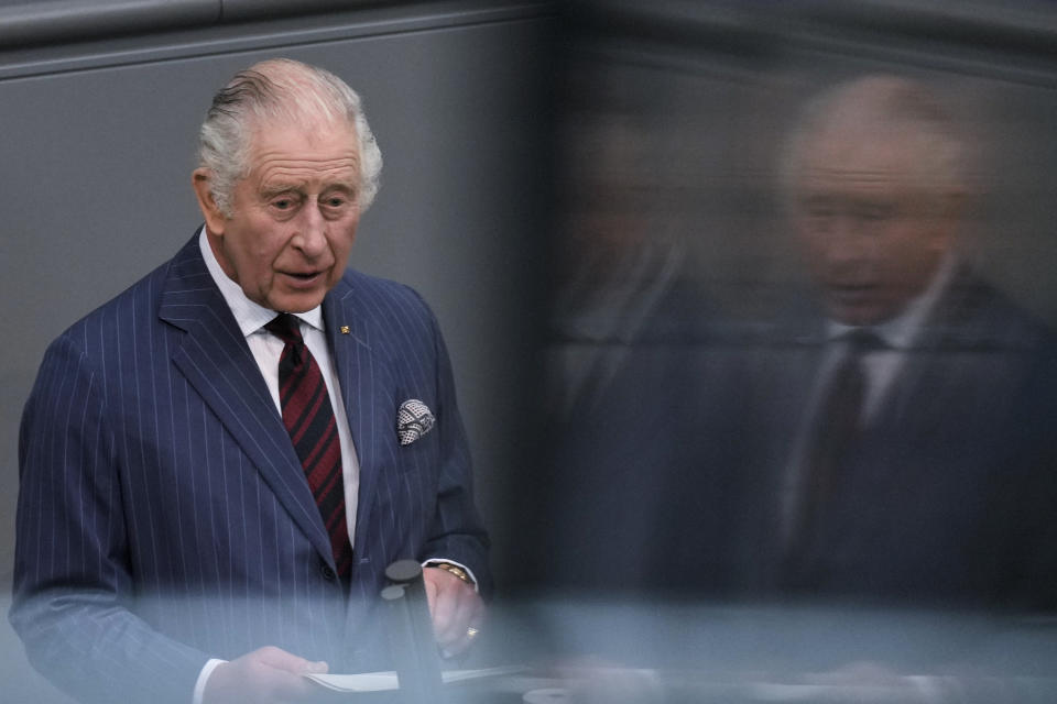 Britain's King Charles III, left, addresses the Bundestag, Germany's Parliament, in Berlin, Thursday, March 30, 2023. King Charles III arrived Wednesday for a three-day official visit to Germany. (AP Photo/Markus Schreiber)