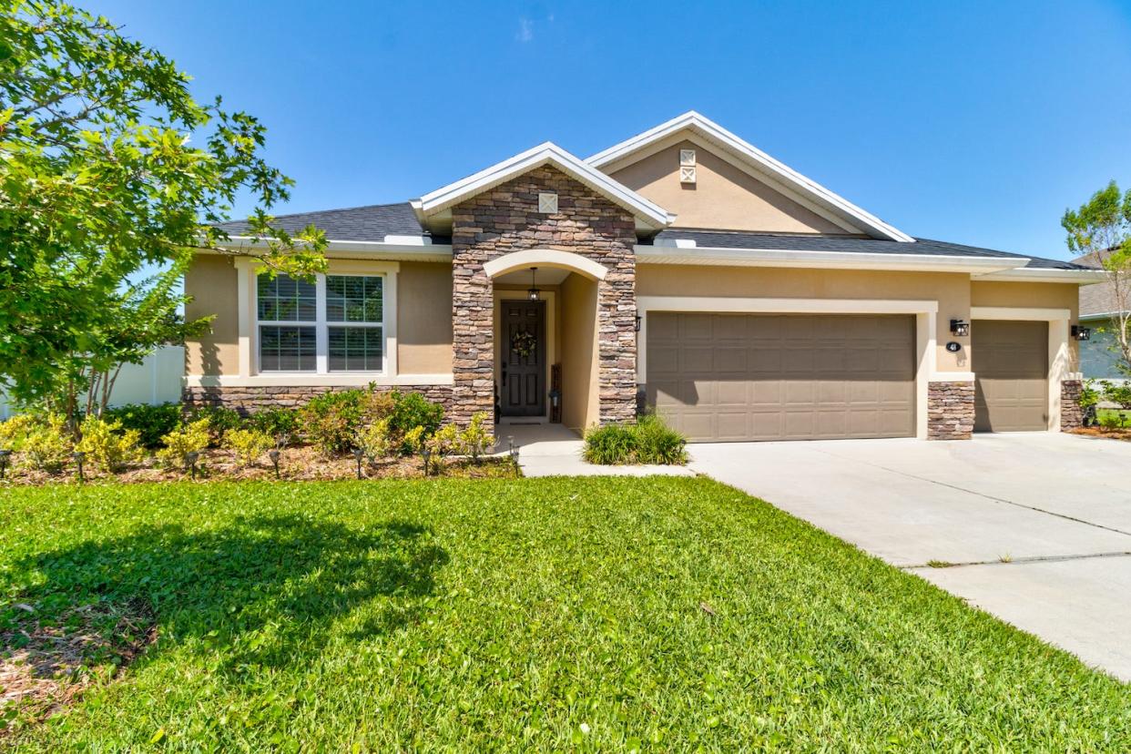 Nestled on a lake in the highly desirable Deer Creek area of Hunters Ridge in Ormond Beach, this four-bedroom, two-bath home with a three-car garage was made for families who love to host gatherings.