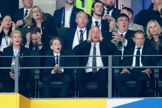 <p>Jean Catuffe/Getty</p> Prince George and Prince William at UEFA EURO 2024