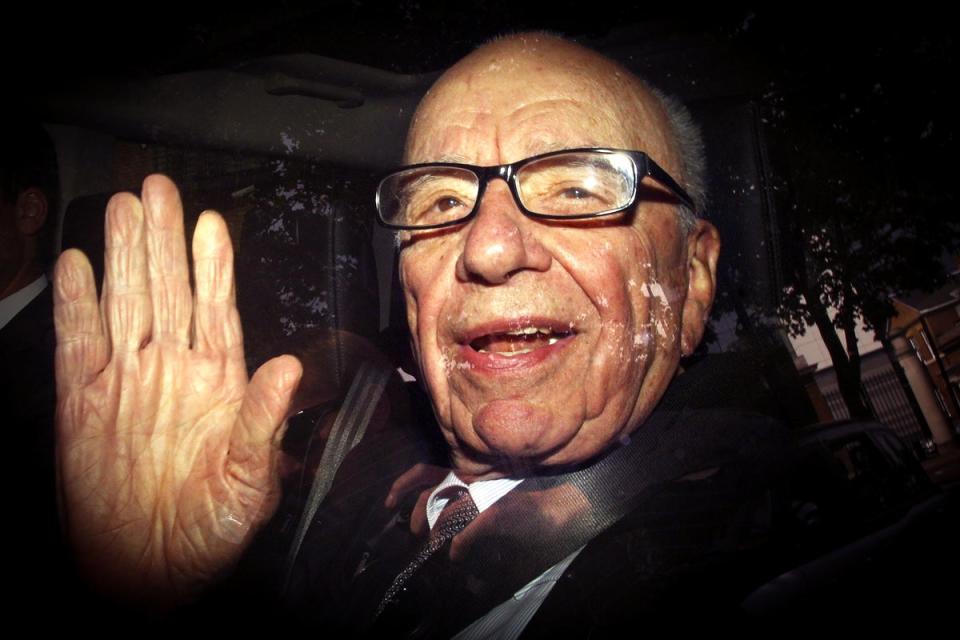 Rupert Murdoch leaving News International headquarters in Wapping, east London, in 2011 (PA)