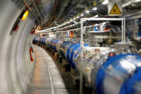 A general view of the Large Hadron Collider (LHC) experiment during a media visit at the Organization for Nuclear Research (CERN) in Saint-Genis-Pouilly, France, near Geneva in Switzerland, July 23, 2014. REUTERS/Pierre Albouy