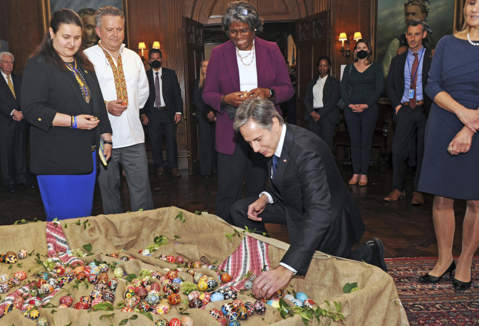 Secretary of State Antony Blinken tours the Ukrainian Institute of America on the Upper Eastside in Manhattan on Thursday, May 19, 2022, in New York. He is joined by U.S. United Nations Ambassador Linda Thomas-Greenfield, maroon third from left, Ukrainian permanent representative Sergiy Kyslytsya, second from left, Ukrainian Ambassador Oksana Markarova, left, and Kathy Nalywajko, far right. (Andrea Renault/Pool via AP)