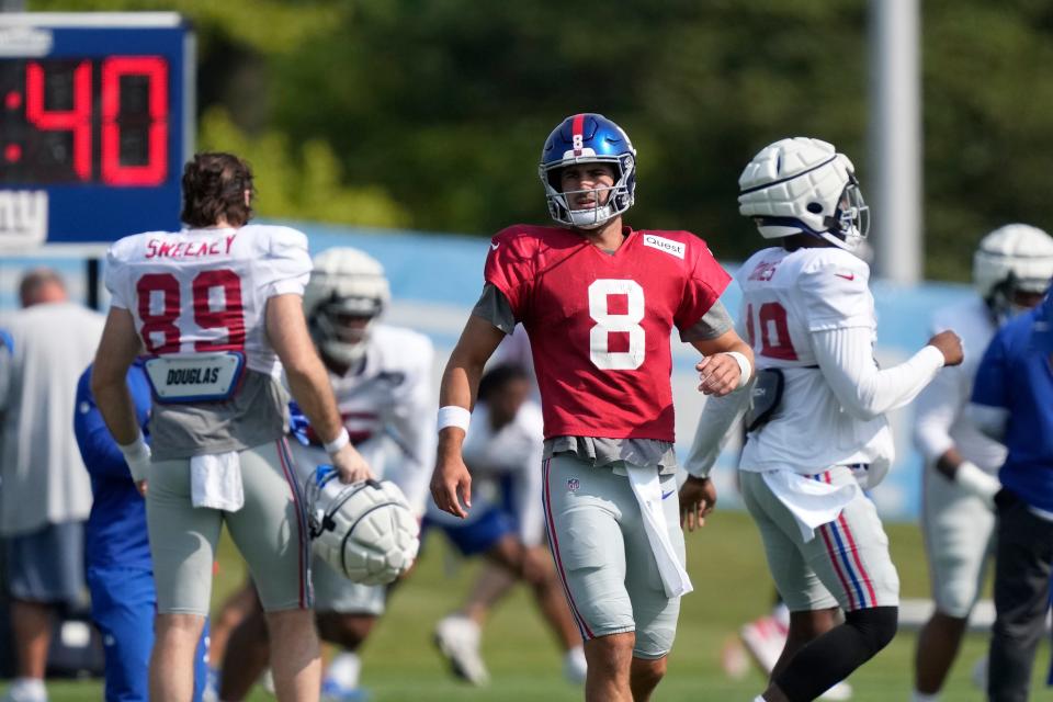 New York Giants quarterback Daniel Jones warms up before an NFL football practice, Tuesday, Aug. 8, 2023, in Allen Park, Mich. (AP Photo/Carlos Osorio)