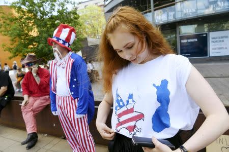 Donald Trump's supporter Liina Isto, the vice-chairman of The True Finns Youth, attends a demonstration ahead of meeting between the U.S. President Donald Trump and Russian President Vladimir Putin in Helsinki, Finland July 15, 2018. Lehtikuva/Martti Kainulainen via REUTERS ATTENTION EDITORS - THIS IMAGE WAS PROVIDED BY A THIRD PARTY. NO THIRD PARTY SALES. NOT FOR USE BY REUTERS THIRD PARTY DISTRIBUTORS. FINLAND OUT. NO COMMERCIAL OR EDITORIAL SALES IN FINLAND.