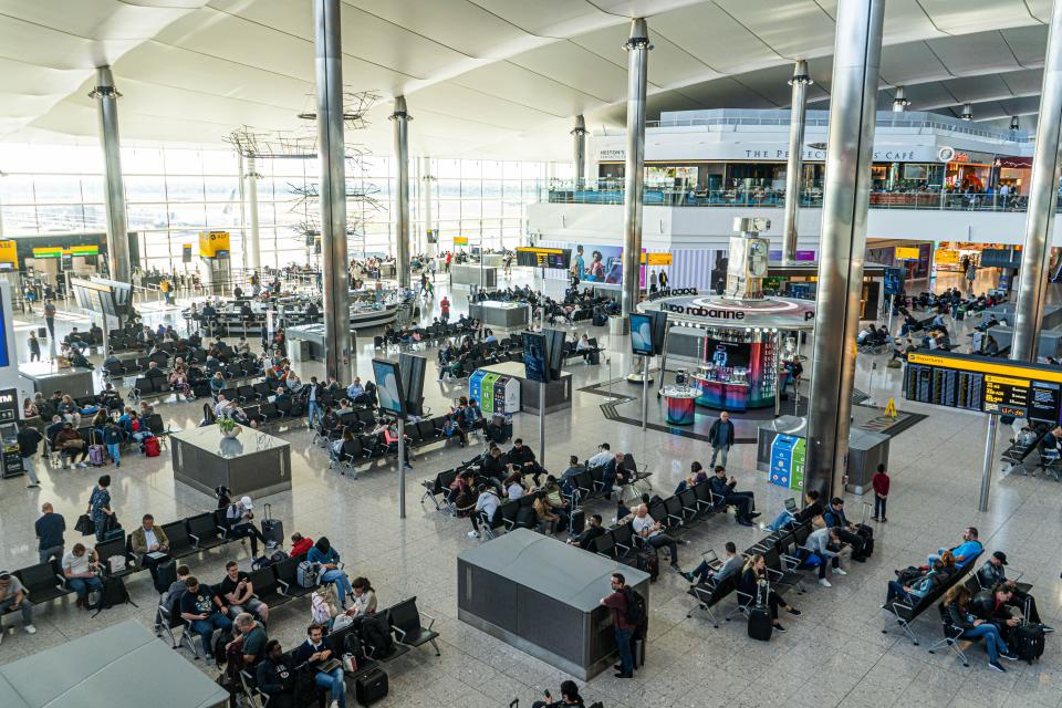 Heathrow airport Terminal 2 is busy with passengers 