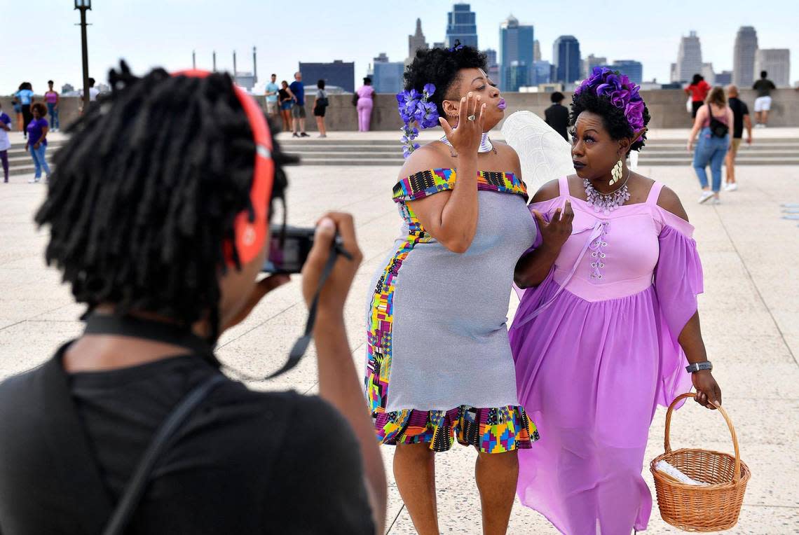 Missy Isamoore, left, and Diana Alexander strike a pose for a portrait by Daniel Alexander during the 6th Annual KC Curly Photoshoot, held in September at the Liberty Memorial.