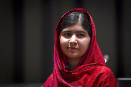 Pakistani schoolgirl activist Malala Yousafzai poses for pictures during a photo opportunity at the United Nations in the Manhattan borough of New York August 18, 2014. REUTERS/Carlo Allegri/Files