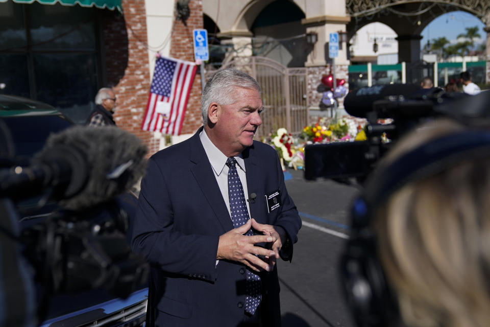 Monterey Park Chief of Police Scott Wiese speaks to reporters near a memorial outside the Star Ballroom Dance Studio on Tuesday, Jan. 24, 2023, in Monterey Park, Calif. A gunman killed multiple people at the ballroom dance studio late Saturday amid Lunar New Years celebrations in the predominantly Asian American community. (AP Photo/Ashley Landis)