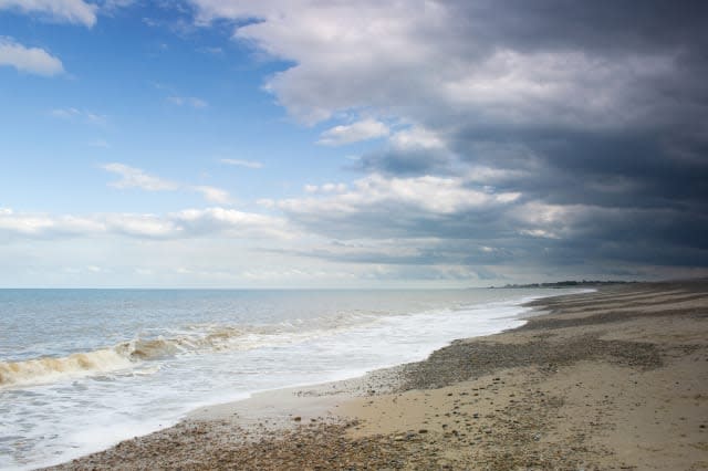 Man dies after cliff collapse on beach in Suffolk