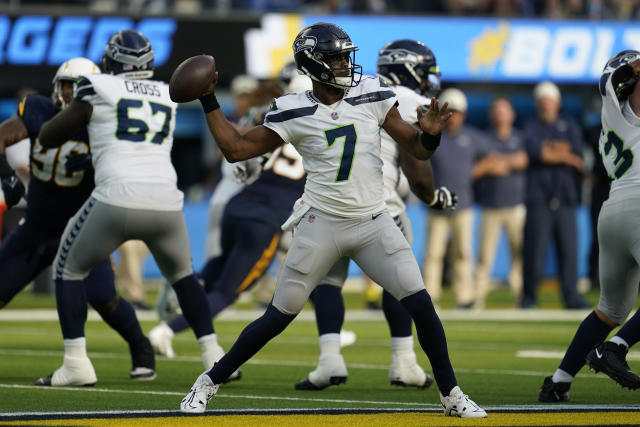 Seattle Seahawks safety Ryan Neal (26) celebrates after a play during the  first half of an NFL football game against the Los Angeles Chargers Sunday,  Oct. 23, 2022, in Inglewood, Calif. (AP