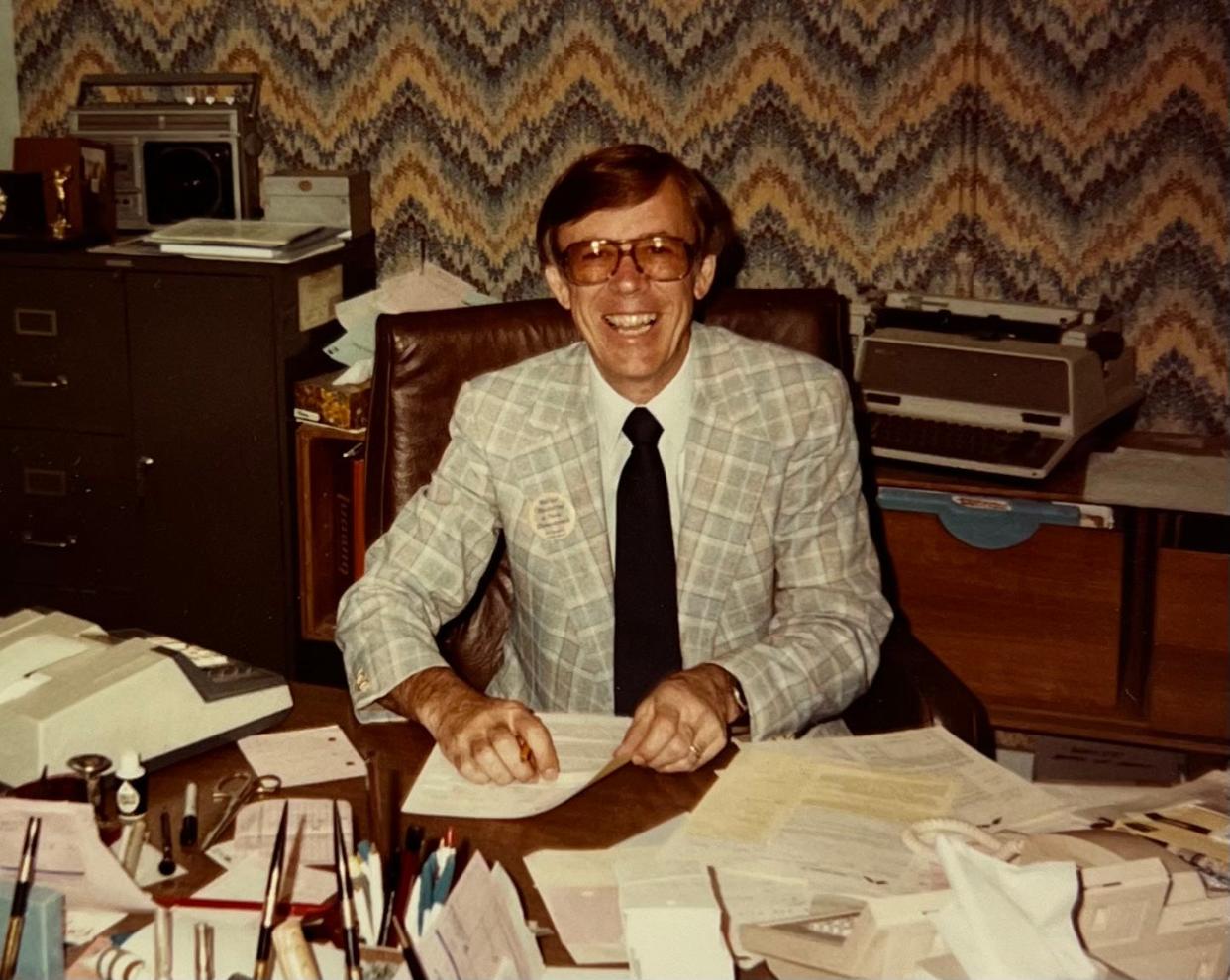 Jerry White sits inside his office at the White House of Music in downtown Waukesha House of Music in 1961. He changed the name of the business to the White House of Music after he took over his cousin's share in 1963.