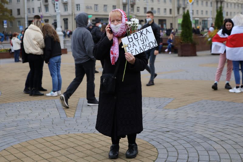 Belarusian opposition supporters hold a rally in Minsk